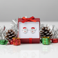 Santa earrings for kids by Melchior Jewellery in festive red gift box with Christmas decorations
