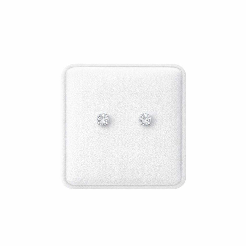 Melchior Jewellery children's clear crystal stud screw back earrings on white display