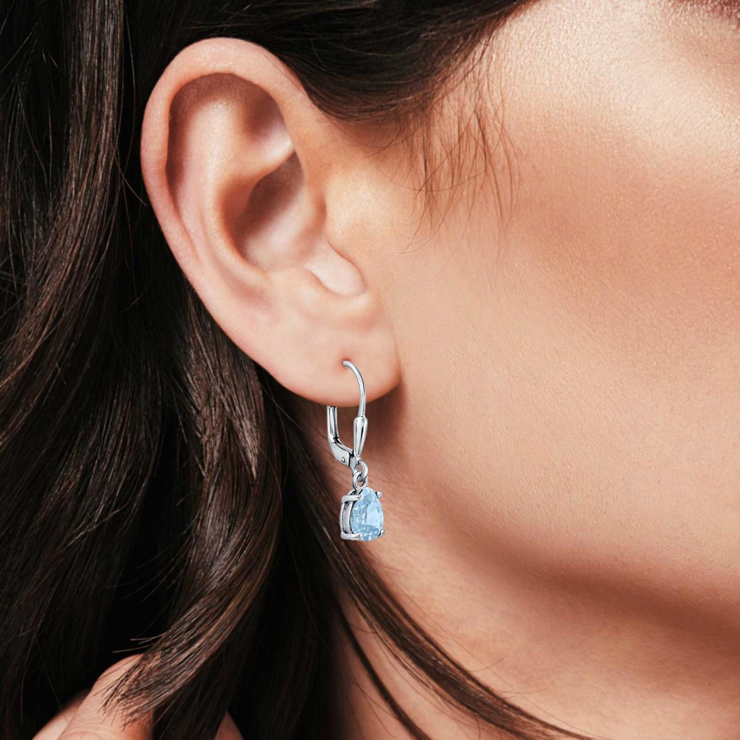 Melchior Jewellery silver aqua bridal teardrop leverback earrings worn on a woman's ear