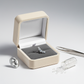 Melchior Jewellery silver CZ labret stud displayed in a beige jewellery box with tweezers and decorative items