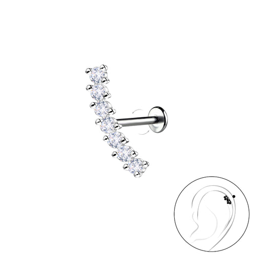 Silver geometric labret stud from Melchior Jewellery featuring a curved row of clear stones for ear piercing
