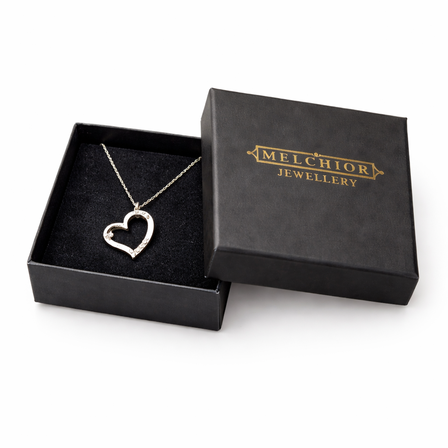 Melchior Jewellery silver open heart pendant necklace displayed in black branded gift box