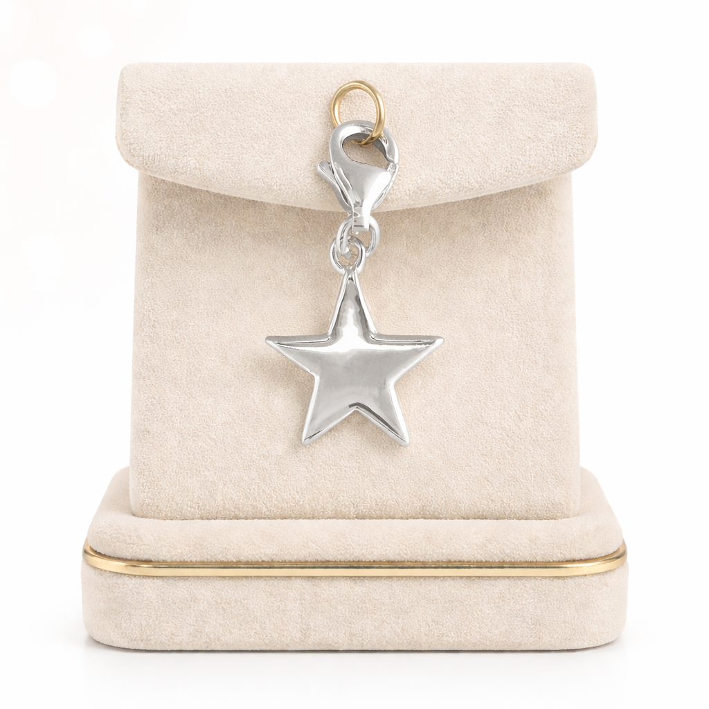 Silver Plain Star Clip On Charm with polished finish displayed on beige velvet stand