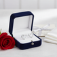 Melchior Jewellery small heart shaped cubic zirconia studs displayed in navy velvet box with red rose