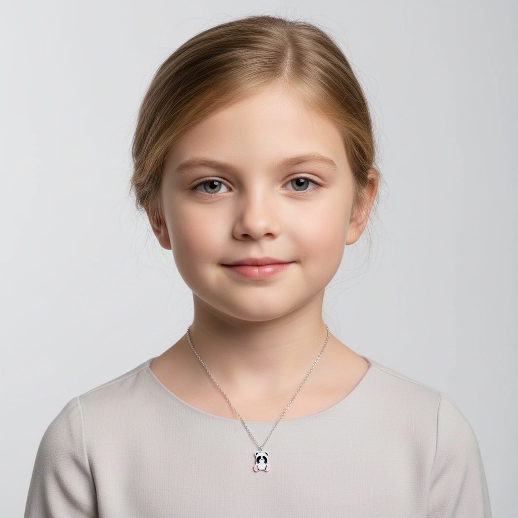 Young girl wearing sparkly panda bear necklace for kids from Melchior Jewellery on silver chain