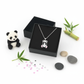 Melchior Jewellery sparkly panda bear necklace for kids displayed in black gift box with panda toy and decorative stones