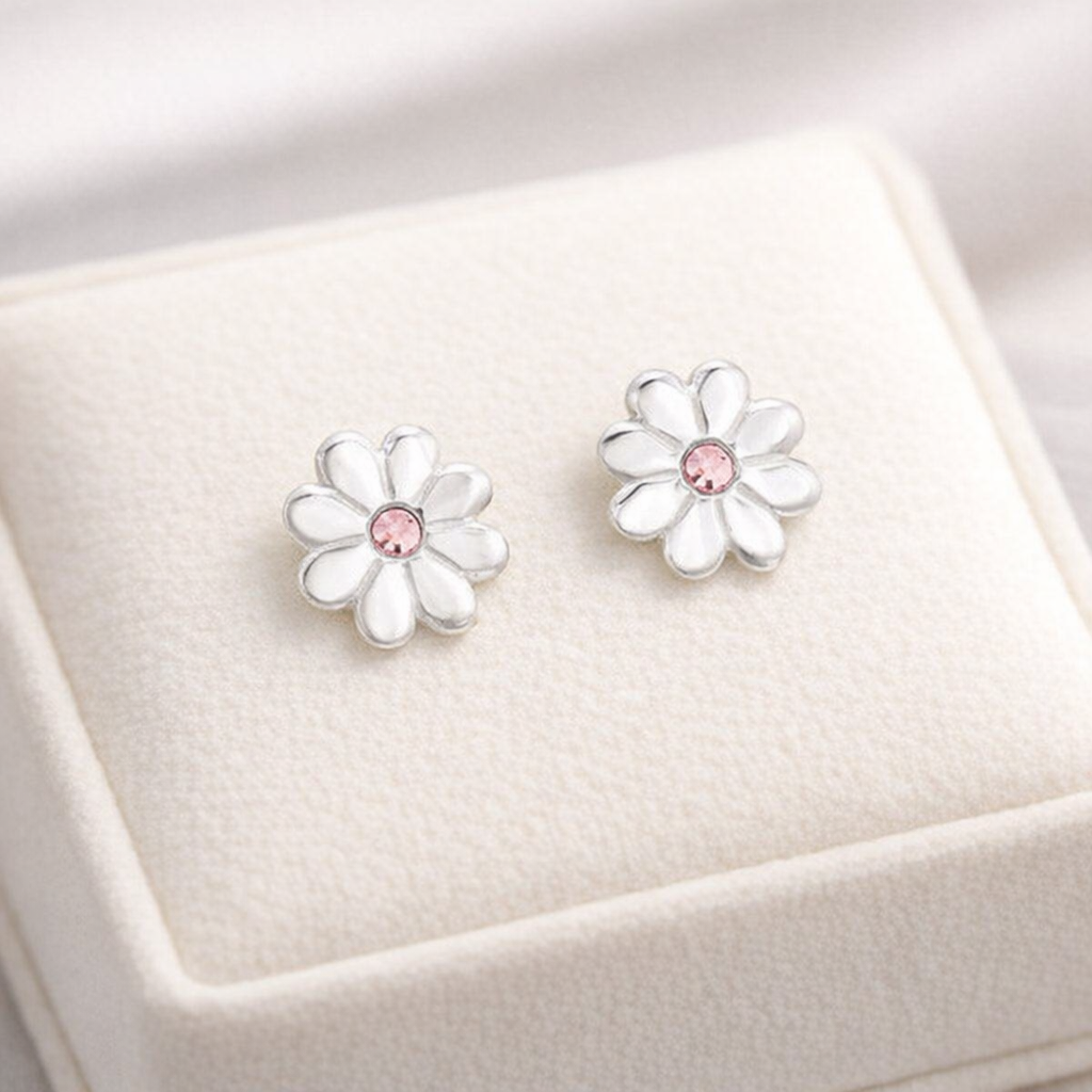 Sterling silver 7mm daisy earrings for girls with white petals and pink centres by Melchior Jewellery