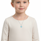 Child wearing a sterling silver animal pendant for children with a blue paw design necklace