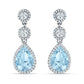 Sterling Silver Aquamarine Halo Drop Earrings by Melchior Jewellery featuring pear-shaped blue stones with crystal halo