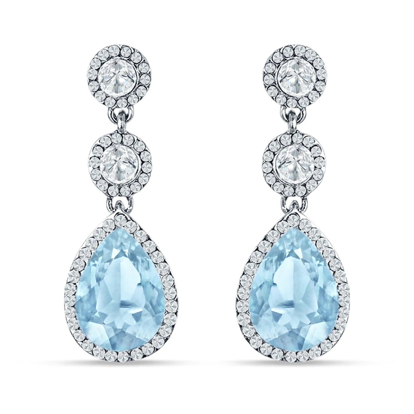 Sterling Silver Aquamarine Halo Drop Earrings by Melchior Jewellery featuring pear-shaped blue stones with crystal halo