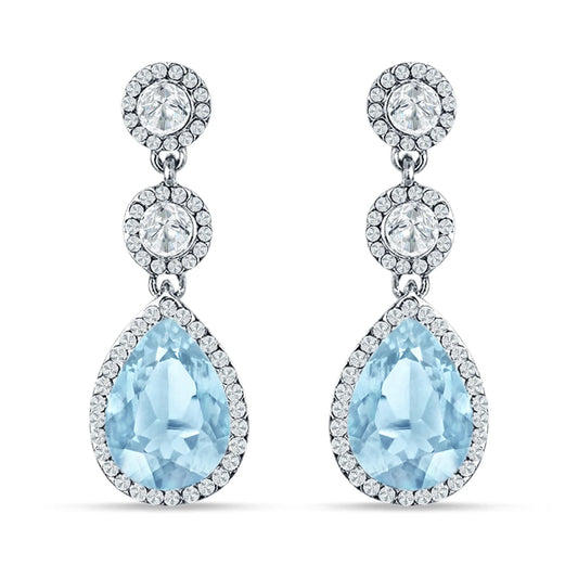 Sterling Silver Aquamarine Halo Drop Earrings by Melchior Jewellery featuring pear-shaped blue stones with crystal halo