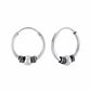 Sterling silver bali hoop earrings by Melchior Jewellery featuring a central silver bead with black detailing