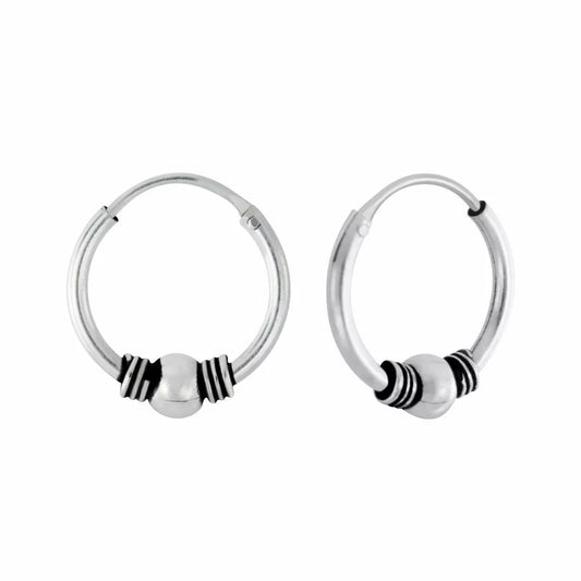 Sterling silver bali hoop earrings by Melchior Jewellery featuring a central silver bead with black detailing