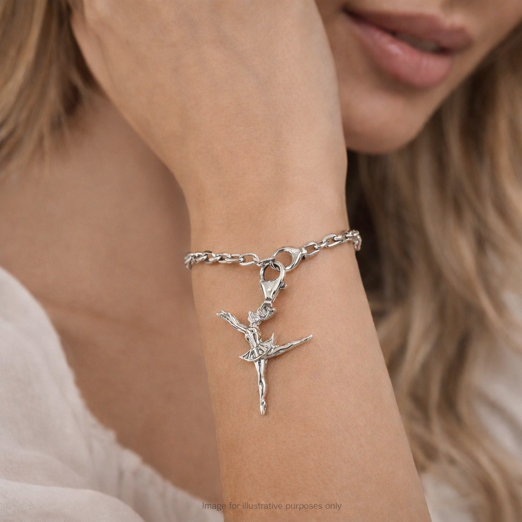 Sterling Silver Ballerina Charm by Melchior Jewellery on delicate silver chain bracelet worn on wrist
