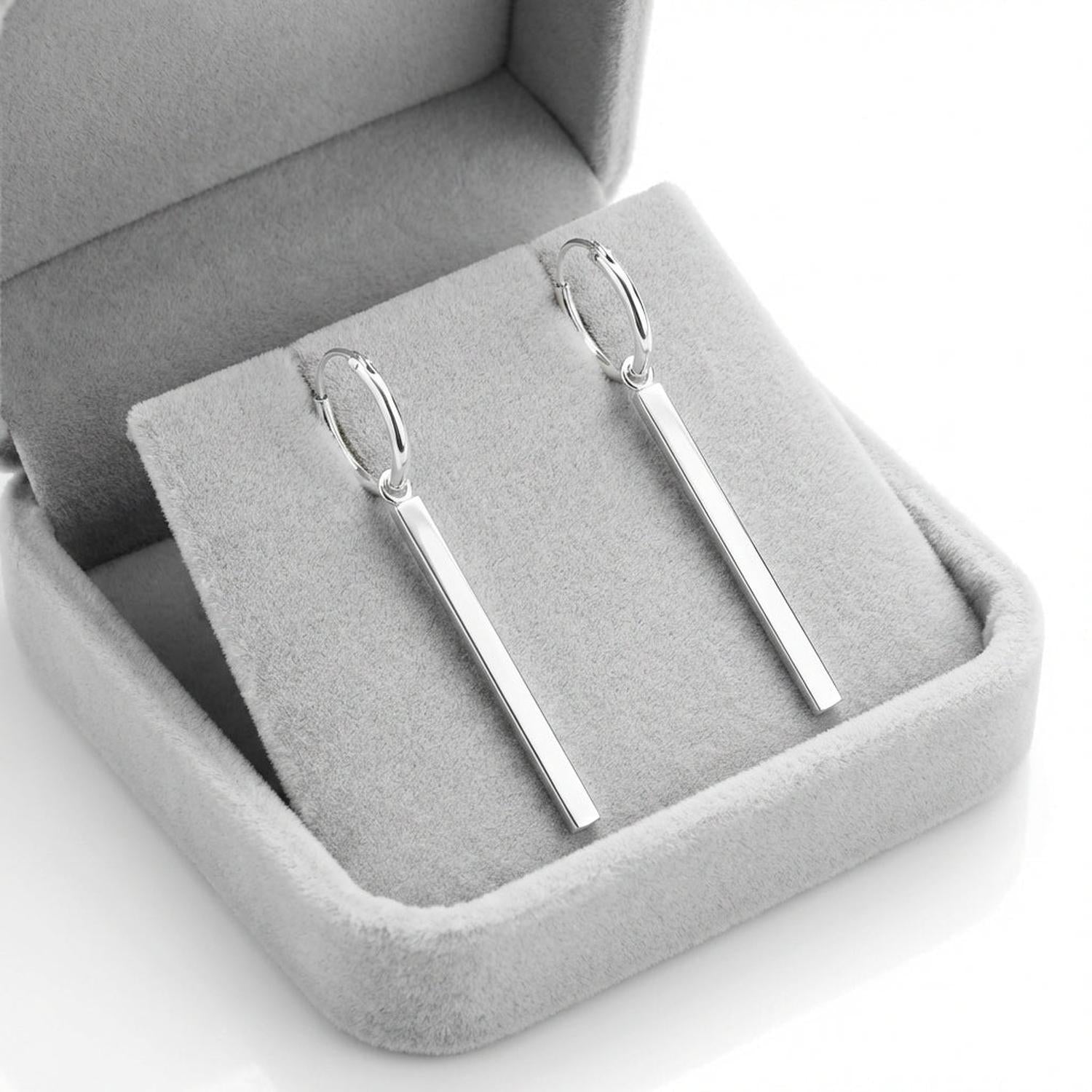Melchior Jewellery sterling silver bar charm hoop earrings displayed in grey jewellery box