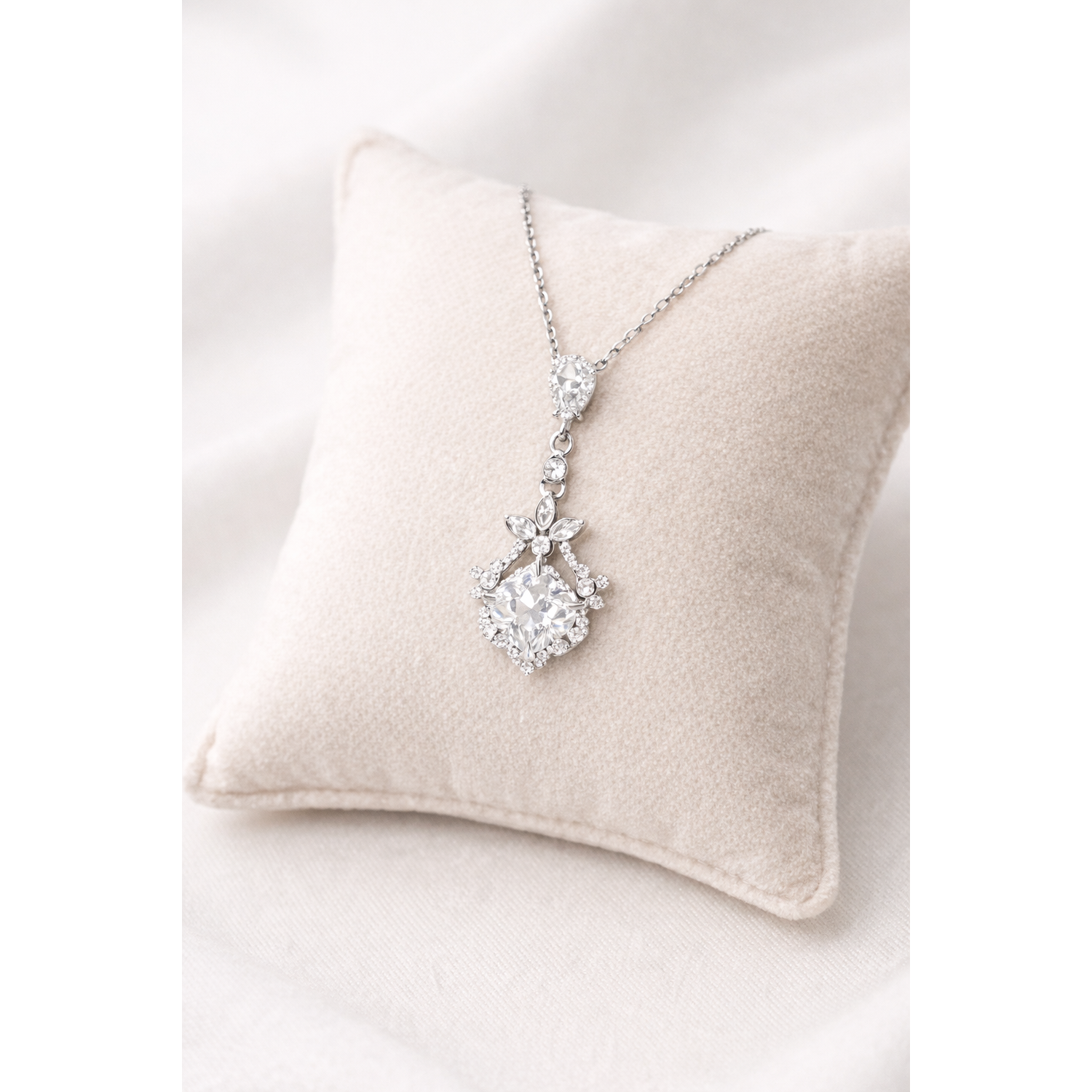 Elegant Melchior Jewellery sterling silver bridal necklace with sparkling crystals on a soft cushion