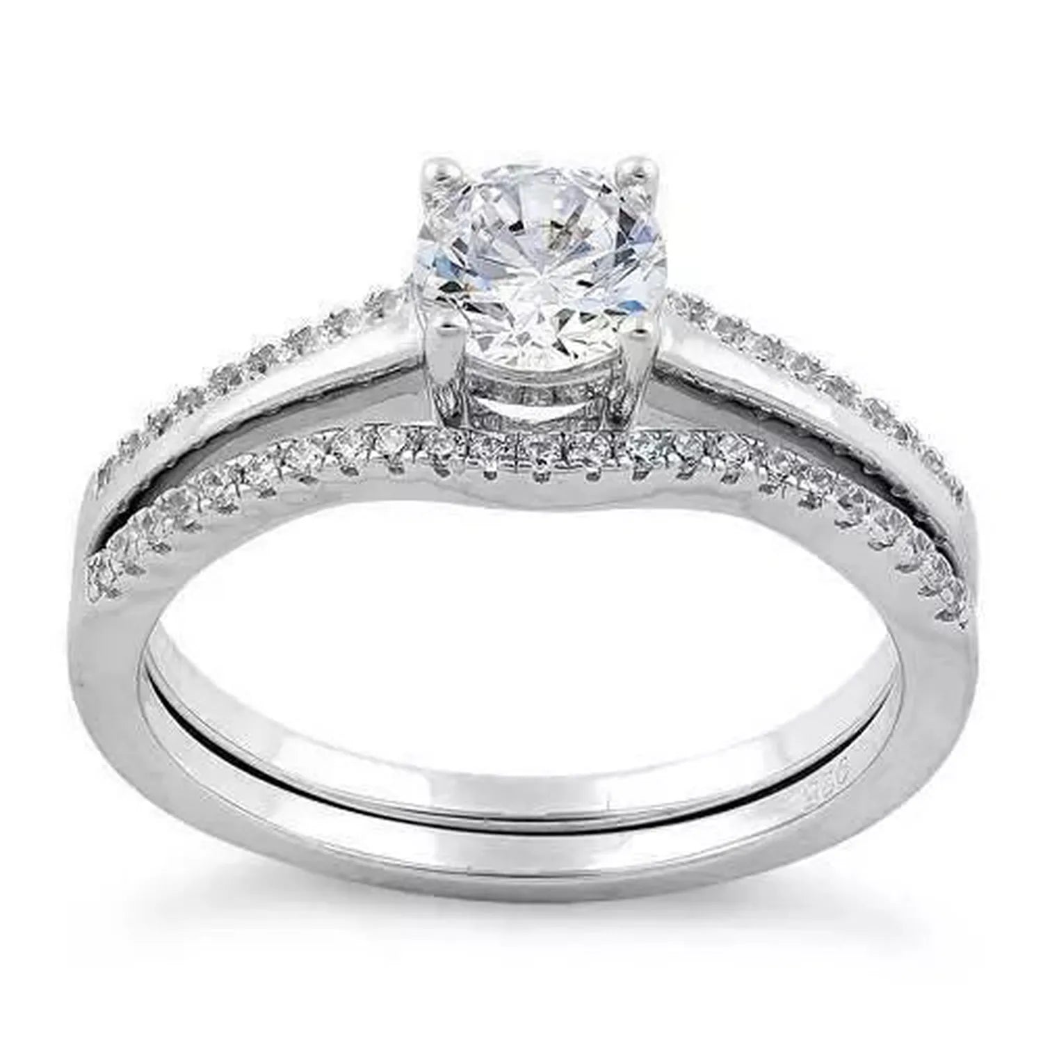 Melchior Jewellery sterling silver bridal ring set with central round-cut stone and pavé band detailing