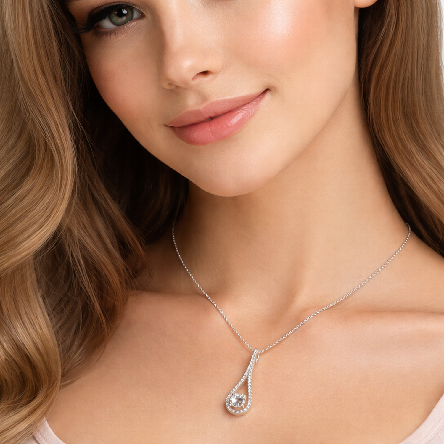 Sterling Silver Bridal Unity Teardrop Necklace worn by woman with soft waves and natural makeup