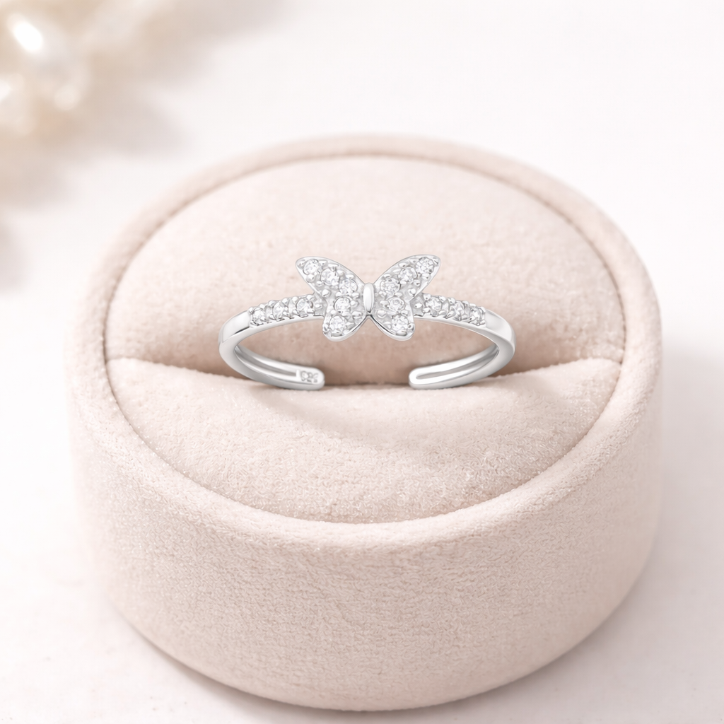 Sterling silver butterfly toe ring with sparkling crystals on an adjustable band from Melchior Jewellery