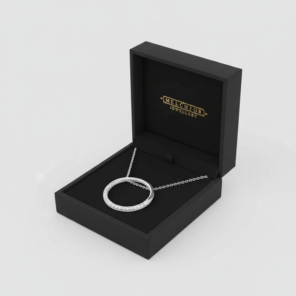 Melchior Jewellery sterling silver circle necklace displayed in a black branded jewellery box