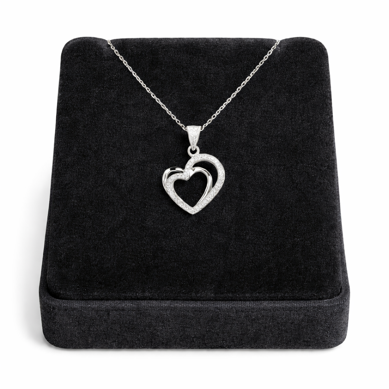 Melchior Jewellery sterling silver double heart necklace displayed on black velvet stand