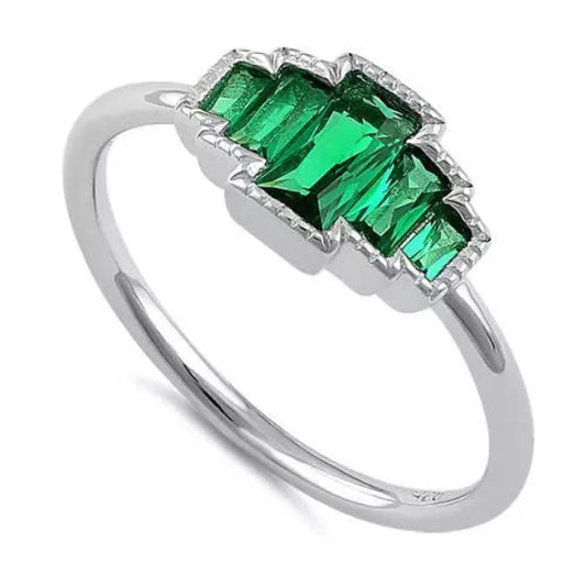 Sterling silver emerald CZ ring by Melchior Jewellery featuring a vibrant green geometric design