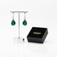 Melchior Jewellery sterling silver emerald drop earrings displayed with black branded box