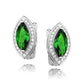 Sterling silver emerald stud earrings with marquise cut green stones and surrounding clear crystals by Melchior Jewellery