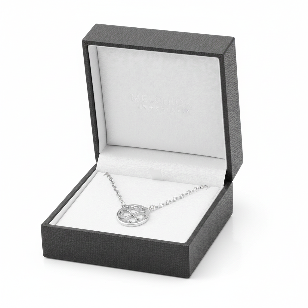 Sterling silver four leaf clover necklace by Melchior Jewellery in a black presentation box