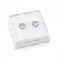 Sterling silver heart earrings for girls with purple gemstones in a white jewellery box by Melchior Jewellery
