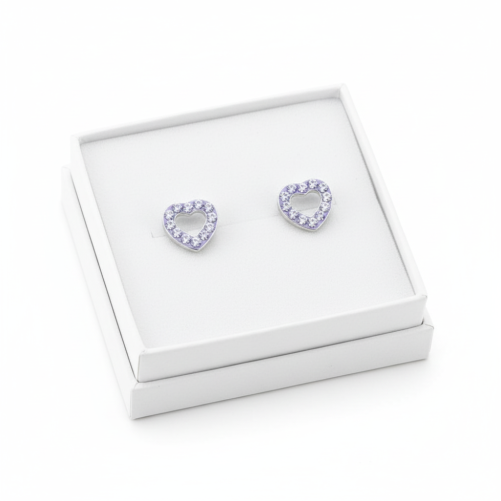 Sterling silver heart earrings for girls with purple gemstones in a white jewellery box by Melchior Jewellery