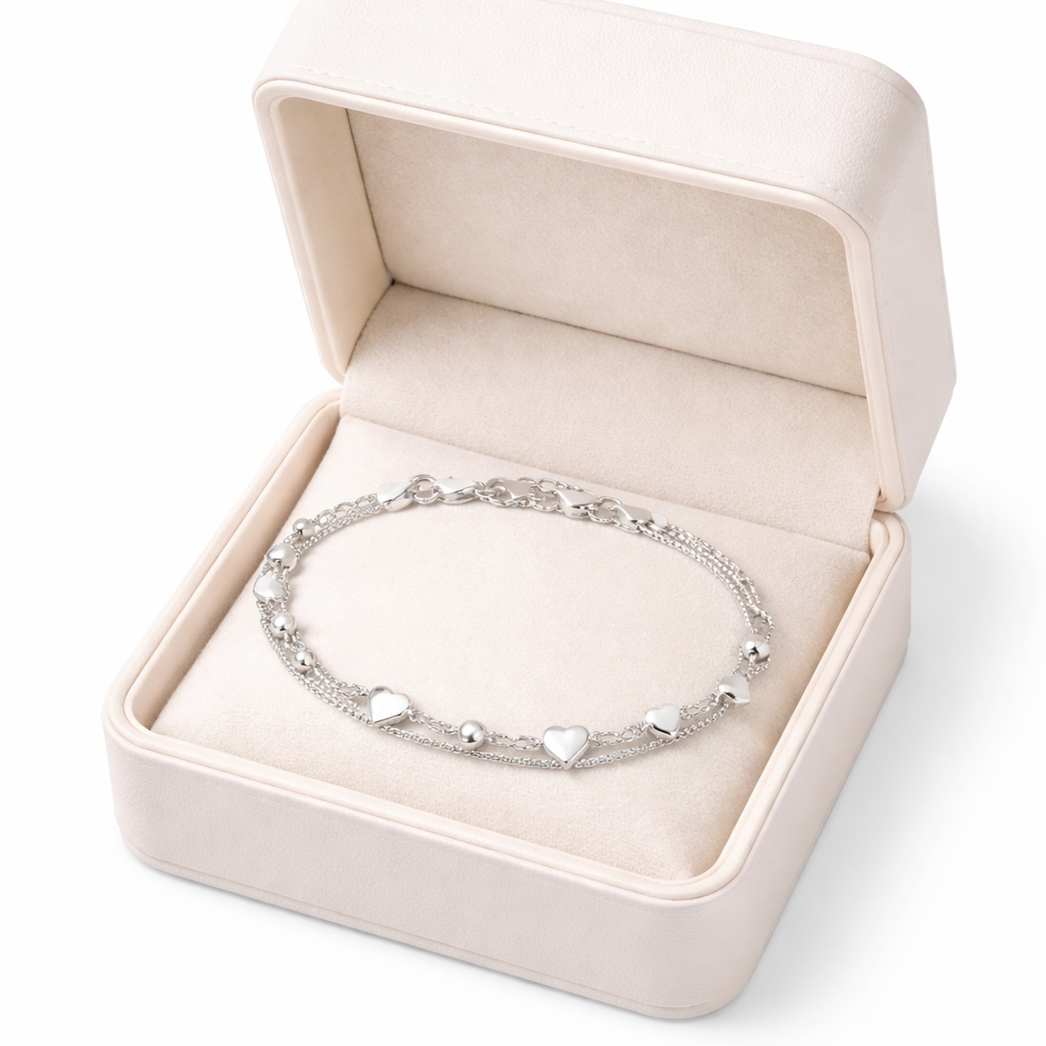 Melchior Jewellery sterling silver hearts bracelet for women displayed in a cream jewellery box