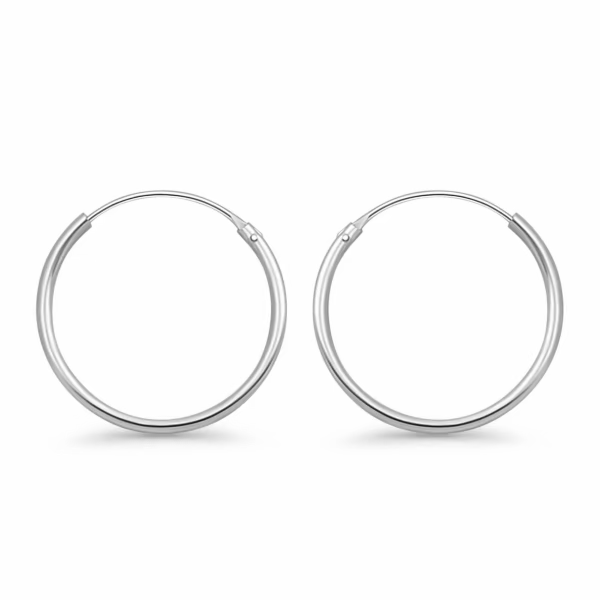 Melchior Jewellery slim polished round sterling silver hoop earrings classic everyday pair on white background