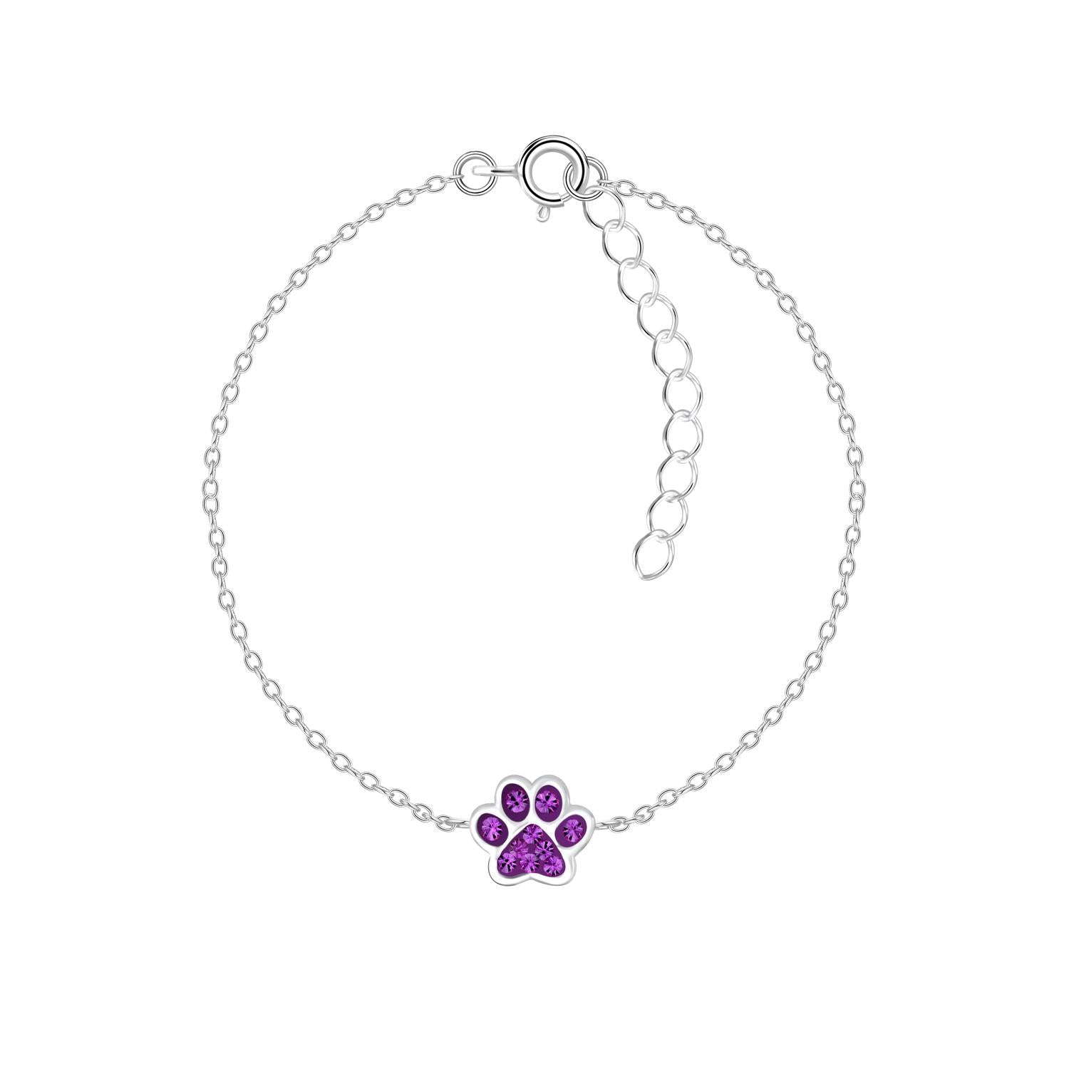 Sterling silver kids paw bracelet by Melchior Jewellery featuring a purple paw charm on a delicate silver chain