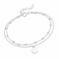 Sterling silver layered bracelet by Melchior Jewellery with delicate chains and round charm