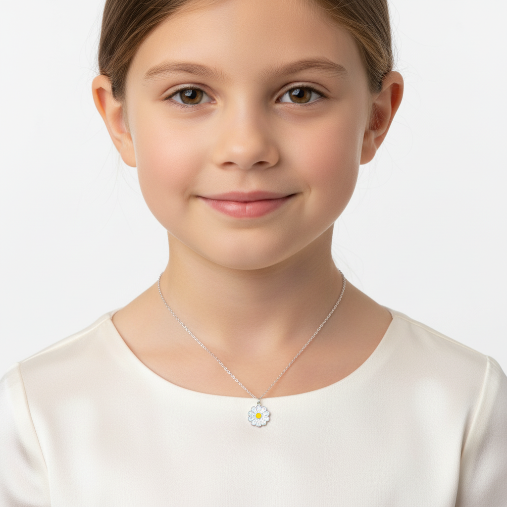 Sterling silver necklace for children with a delicate daisy pendant worn by a young girl