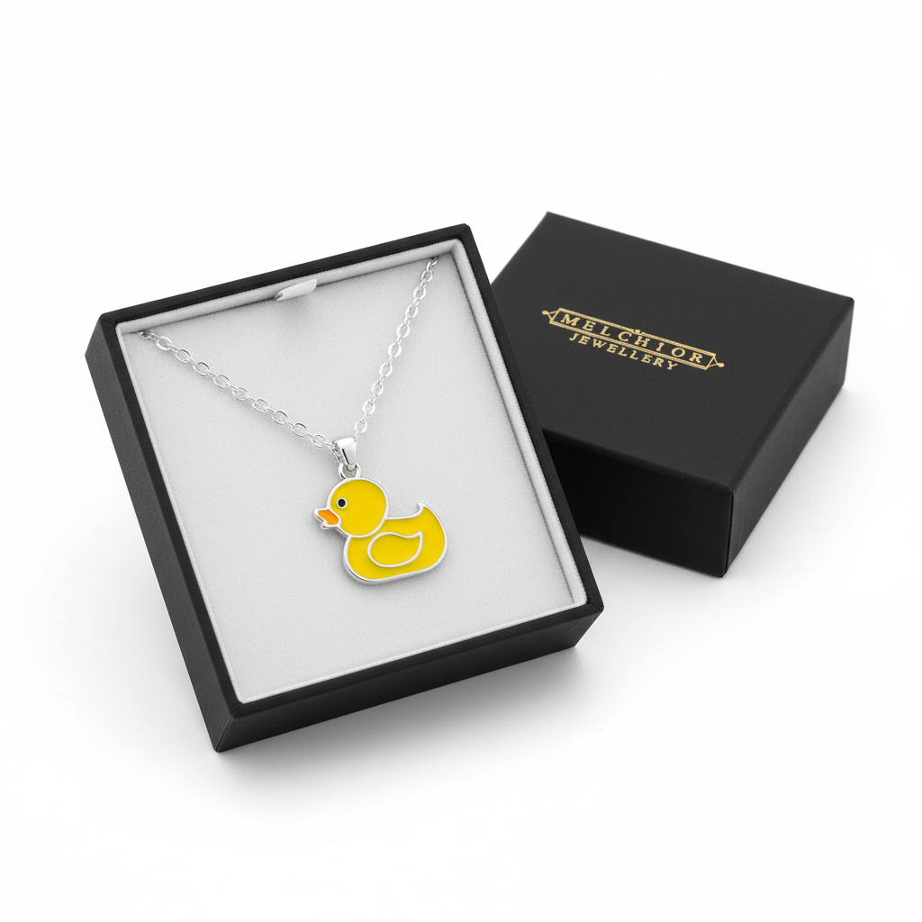 Sterling silver necklace for children with yellow duck pendant in Melchior Jewellery black gift box