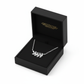 Sterling silver olive leaf necklace from Melchior Jewellery displayed in a black presentation box