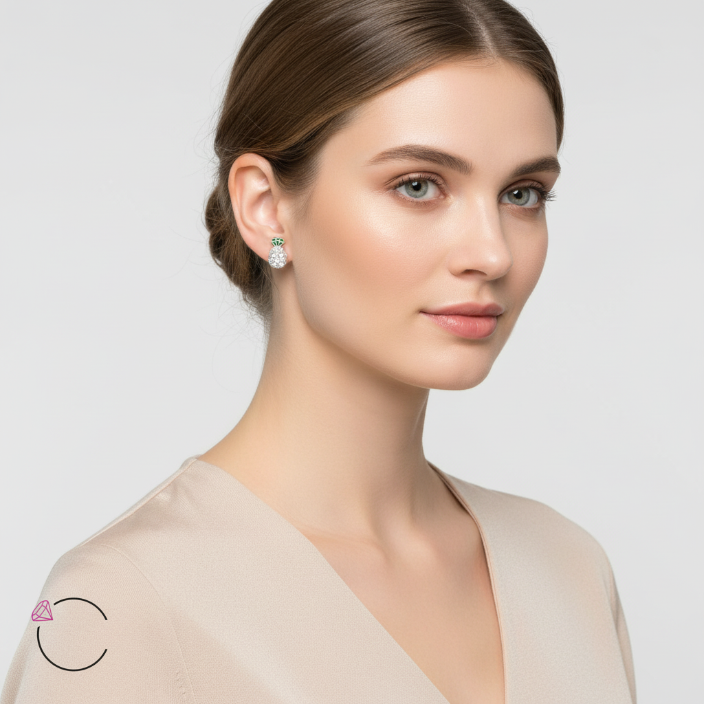 Melchior Jewellery sterling silver pineapple stud earrings worn by woman with neutral makeup and beige top