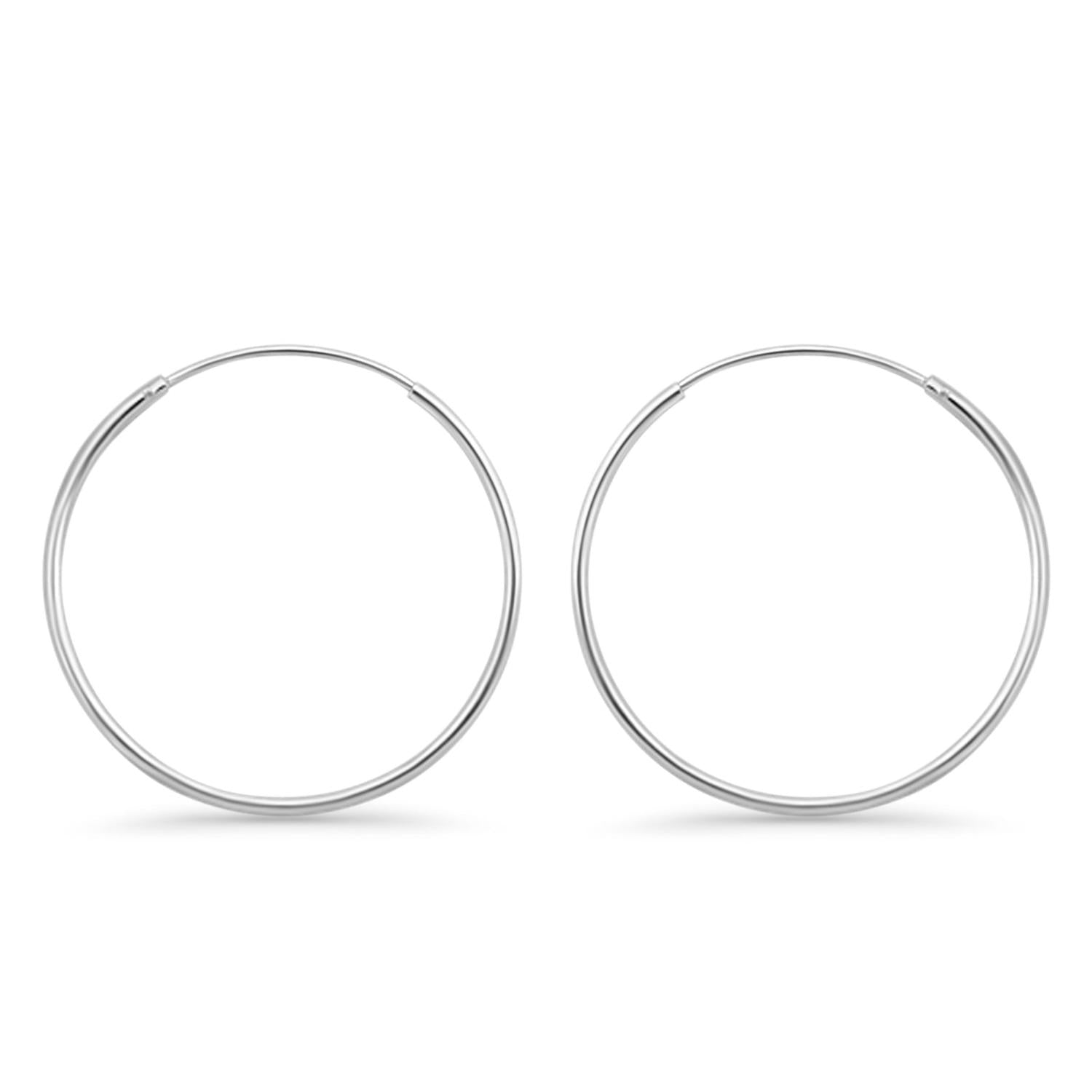 Melchior Jewellery minimalist round sterling silver rhodium plated hoop earrings for women polished finish