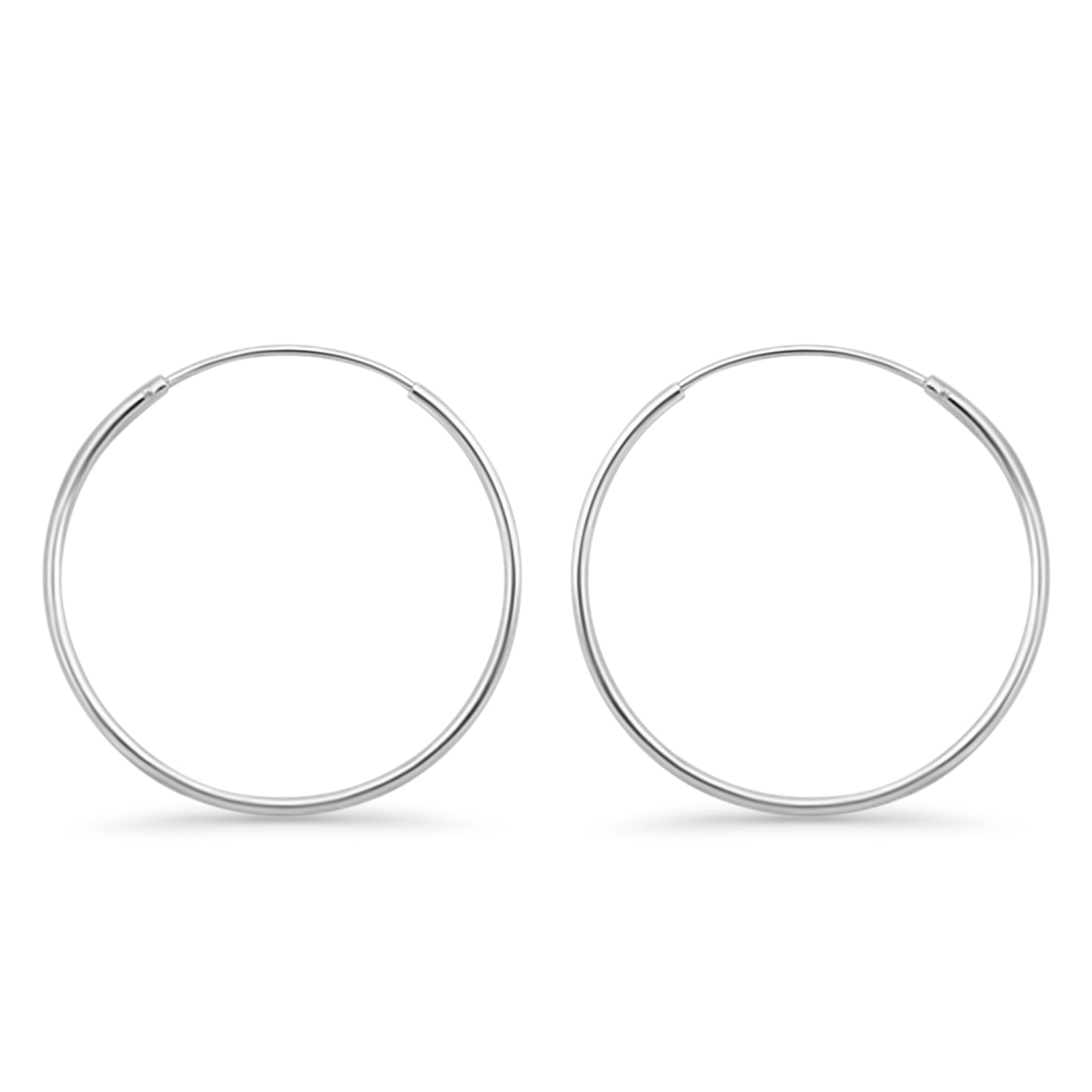 Melchior Jewellery minimalist round sterling silver rhodium plated hoop earrings for women polished finish