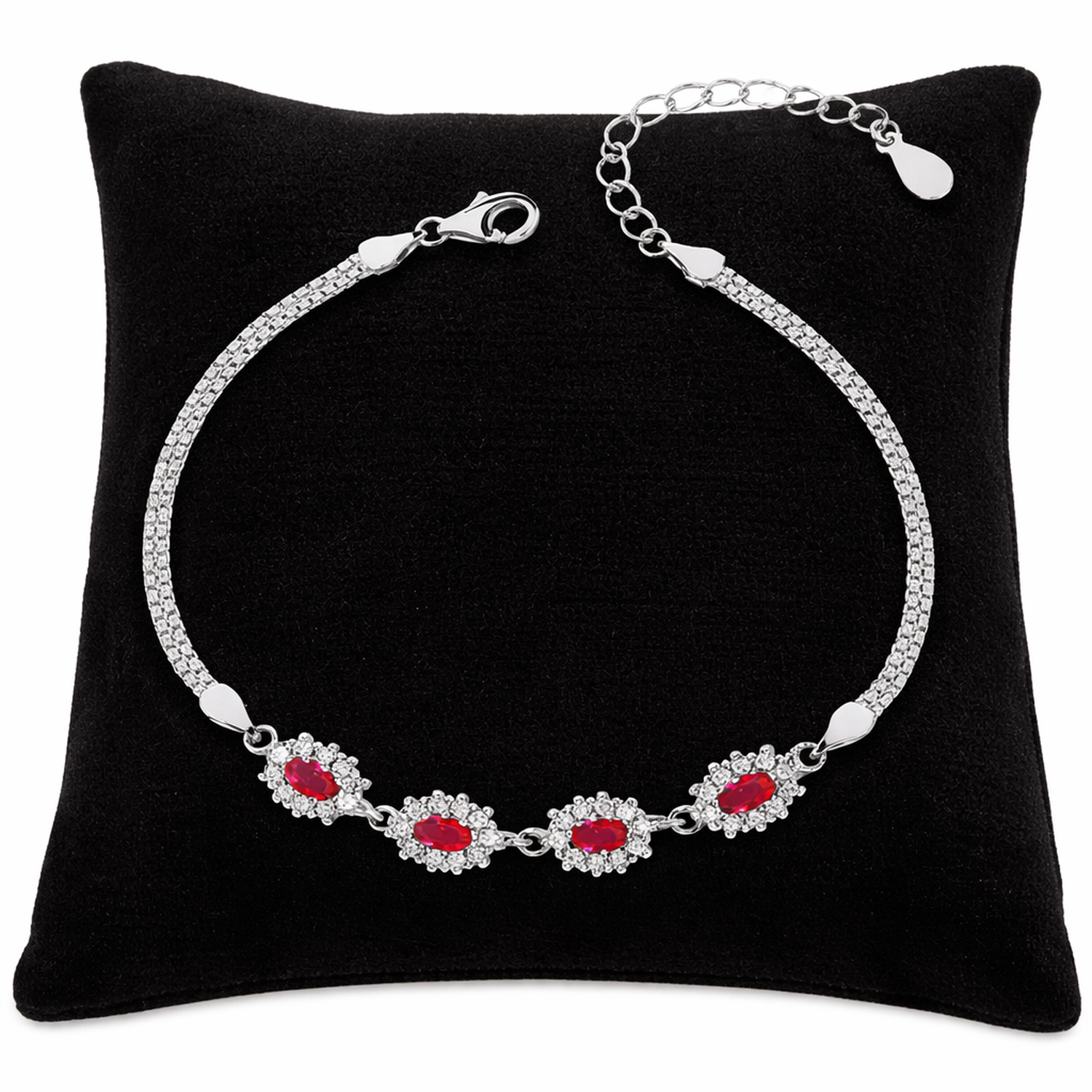 Sterling Silver Ruby Cluster Link Bracelet by Melchior Jewellery displayed on black cushion