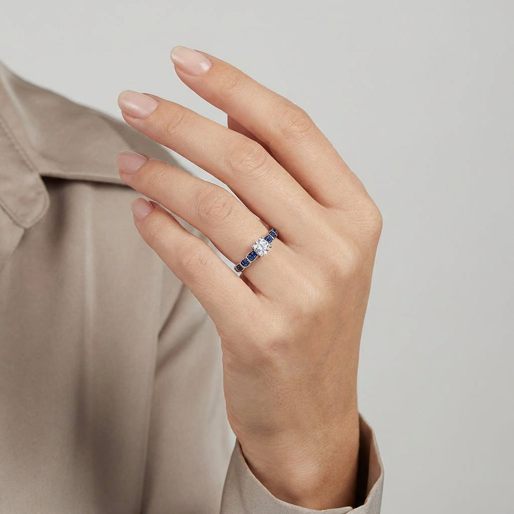 Melchior Jewellery sterling silver sapphire engagement ring worn on hand with blue sapphire stones