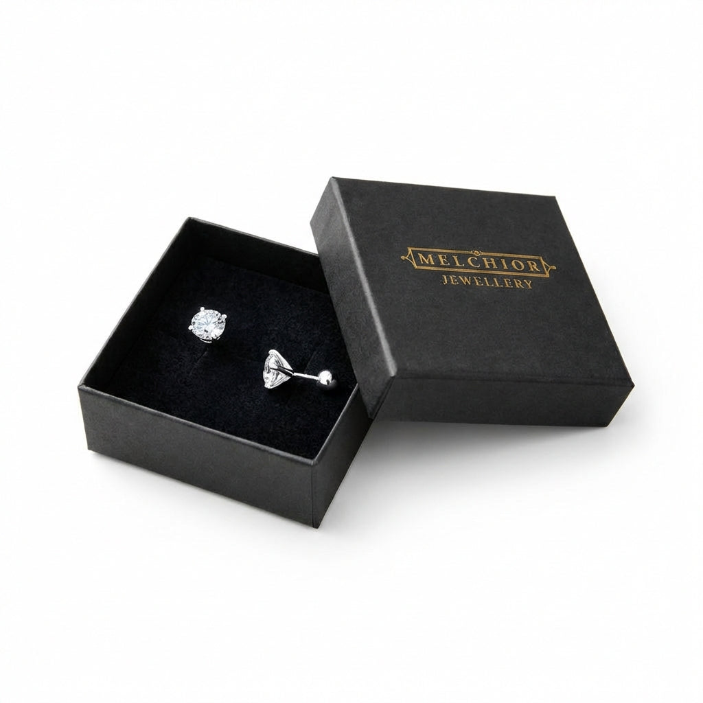 Sterling silver screw back earrings for children displayed in a black jewellery box from In Season Jewellery