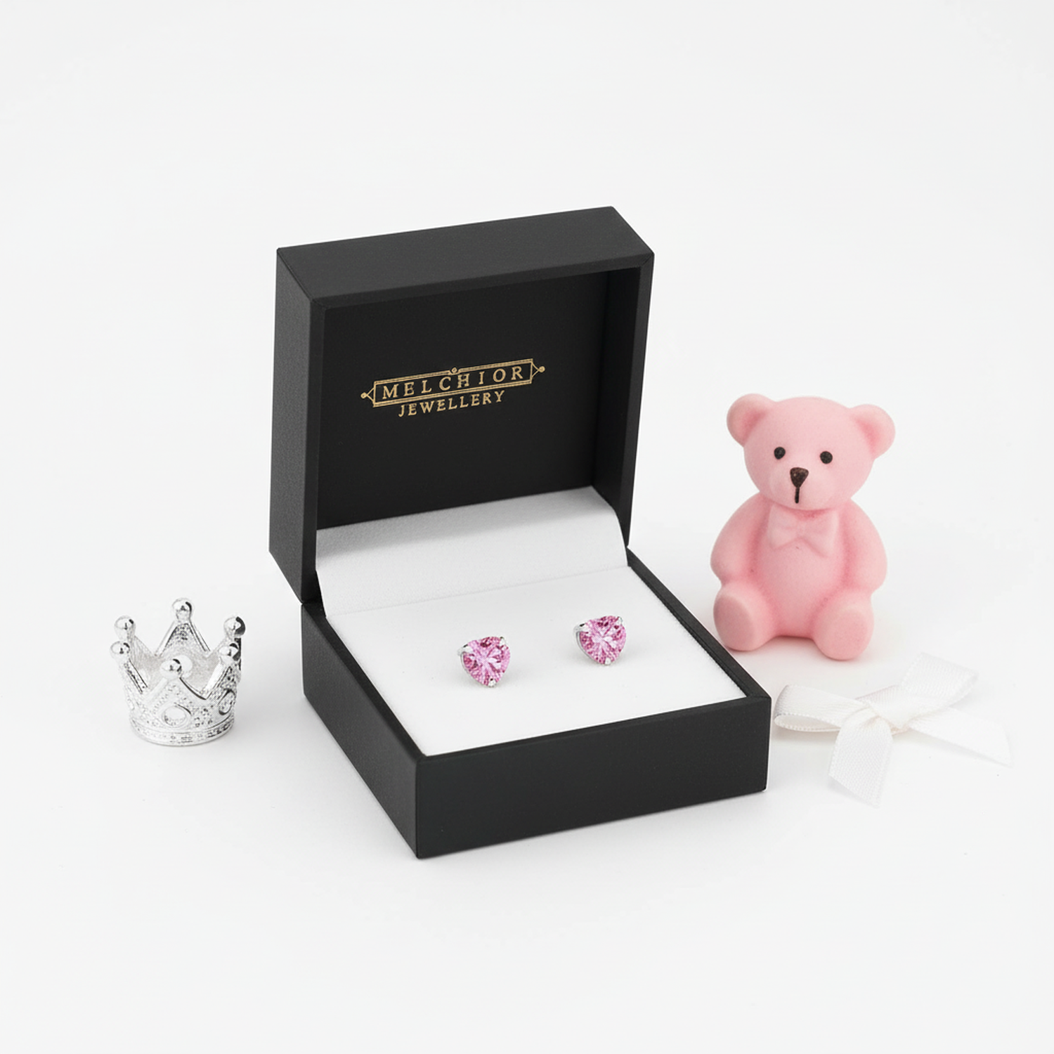 Sterling silver screw back earrings for kids in pink heart shape in Melchior Jewellery black box with teddy bear