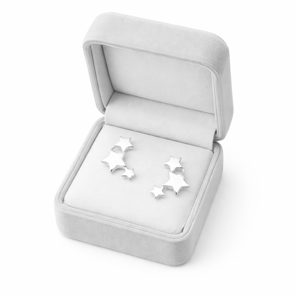 Melchior Jewellery sterling silver star stud earrings in a grey velvet jewellery box