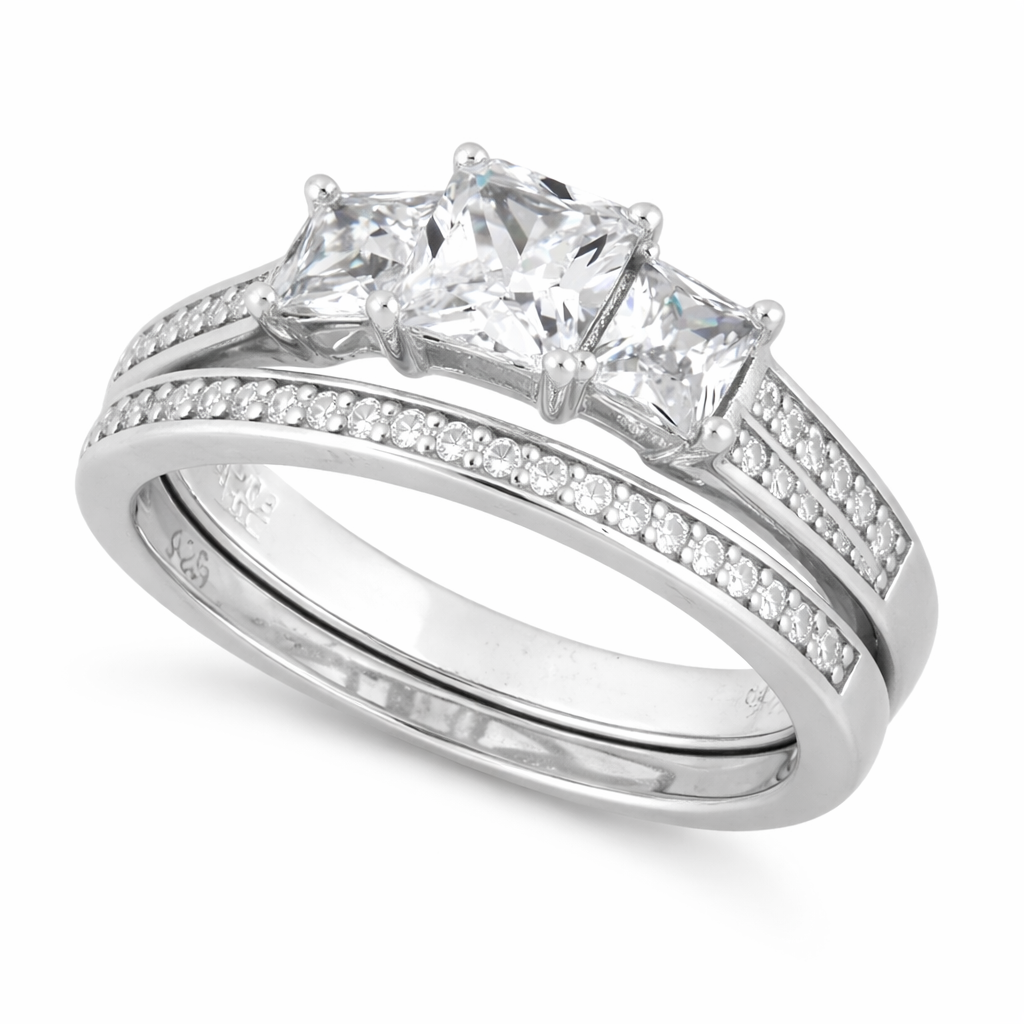 Sterling silver triple CZ engagement ring set with sparkling cubic zirconia stones by Melchior Jewellery