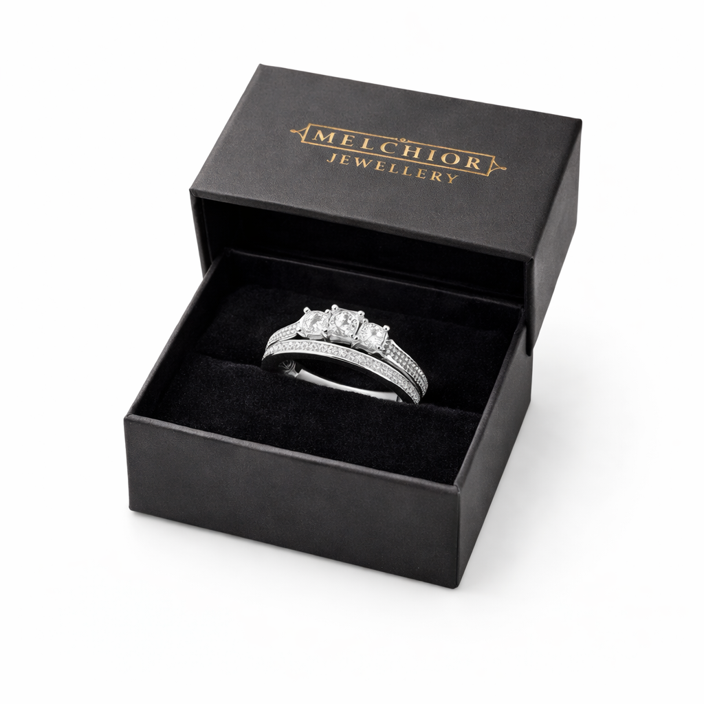 Sterling silver triple CZ engagement ring set in black Melchior Jewellery presentation box