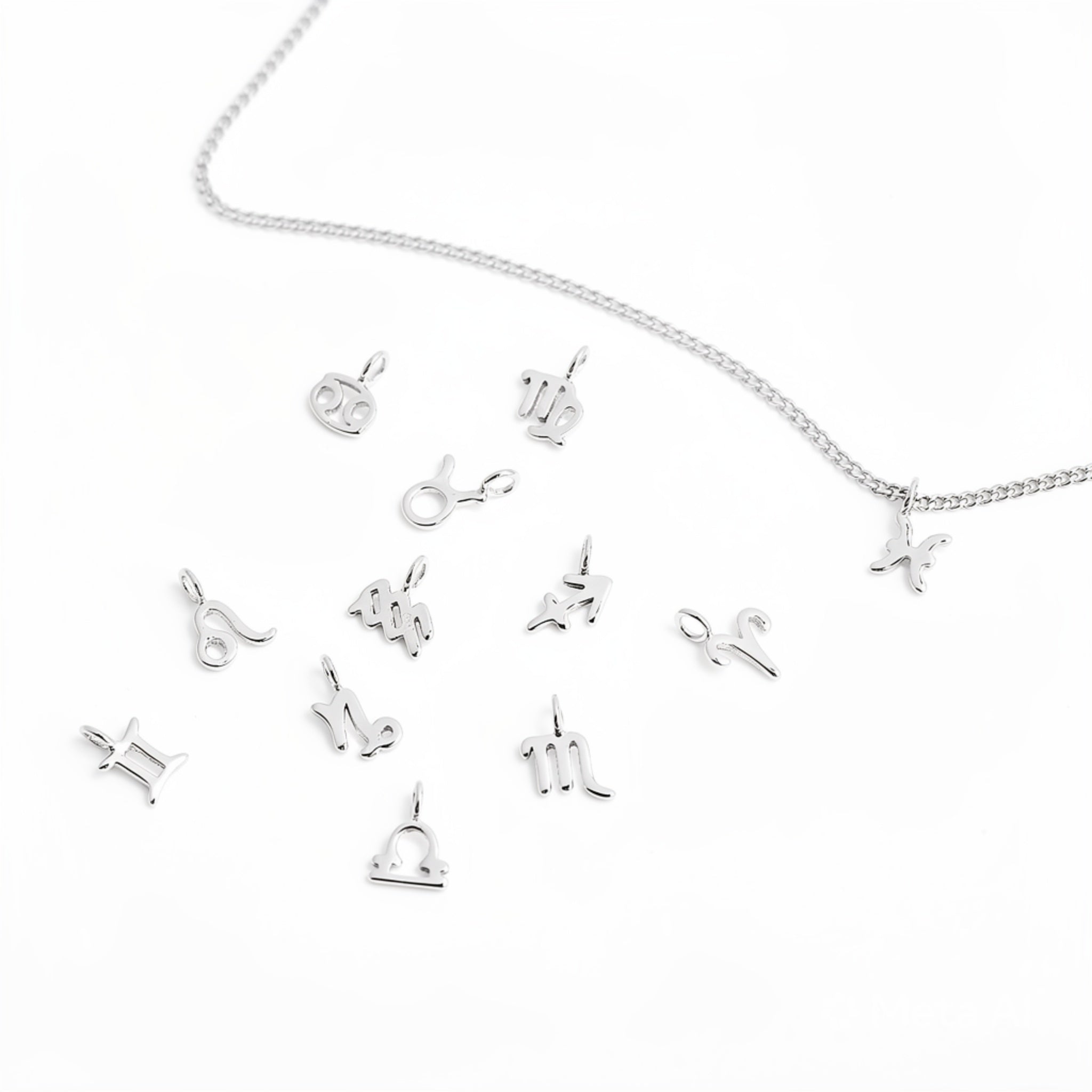 Sterling silver zodiac charm set with all twelve astrological symbols for personalised jewellery