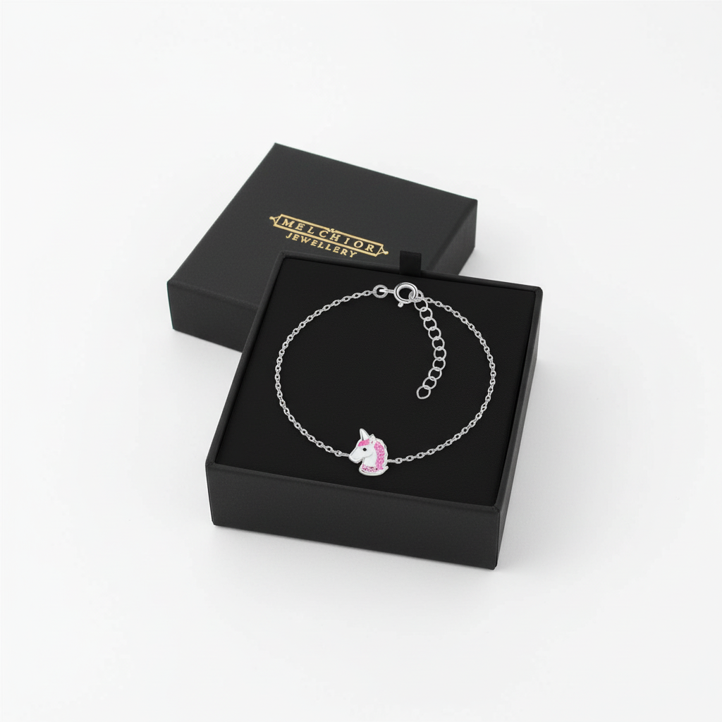Unicorn charm bracelet child by Melchior Jewellery in silver with pink enamel charm in black gift box